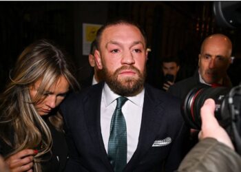 Conor McGregor leaving court following the jury's decision in his sexual assault civil suit.