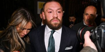Conor McGregor leaving court following the jury's decision in his sexual assault civil suit.