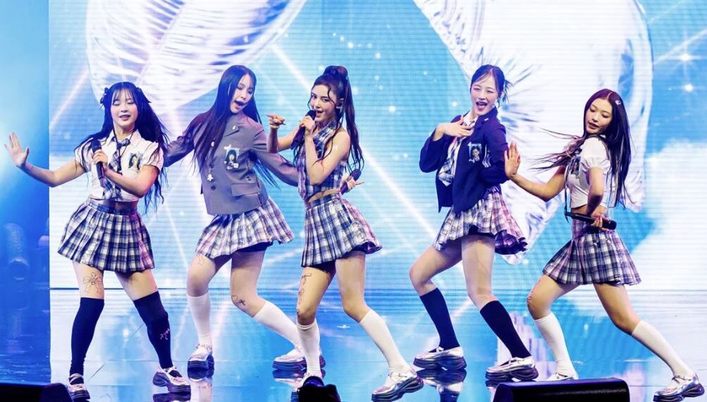 The K-pop group NewJeans performs at the Billboard Women In Music 2024 event.