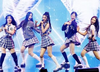 The K-pop group NewJeans performs at the Billboard Women In Music 2024 event.