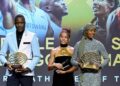 Botswanan sprinter Letsile Tebogo (L) holding his the Men’s Track Athlete of the Year Award and Dutch middle and long-distance runner Sifan Hassan (R) holding her the Women’s Out of Stadium Athlete of the Year Award.