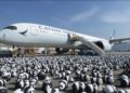 Some of the 2,500 panda sculptures are displayed at the Hong Kong International Airport .