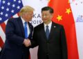 US President-elect Donald Trump talks to China's President Xi Jinping .