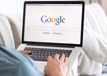 A cursor hovers over Google’s iconic search engine page, symbolizing the start of a new query.