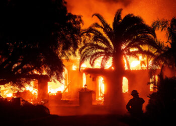 Thousands evacuate as wildfires rage in Hollywood Hills.