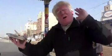 Bagga, 53, sports distinctive blond quiff because of his albinism that makes him resemble Trump .