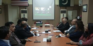 Participants at a meeting held at the Pak American Cultural Centre in Karachi .